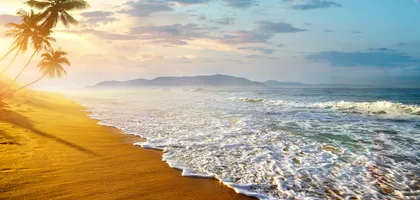 A serene view of the sun-kissed beaches at Unawatuna.