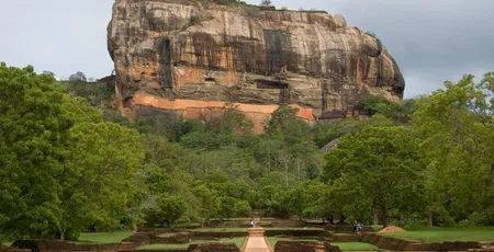 The iconic Sigiriya Rock Fortress rising above the central plains.