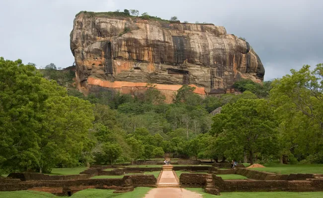The iconic Sigiriya Rock Fortress rising above the central plains.